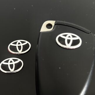 1x TOYOTA Schlüssel OVAL 15mm Aufkleber ALU Schlüssellogo Emblem Schriftzug LOGO
